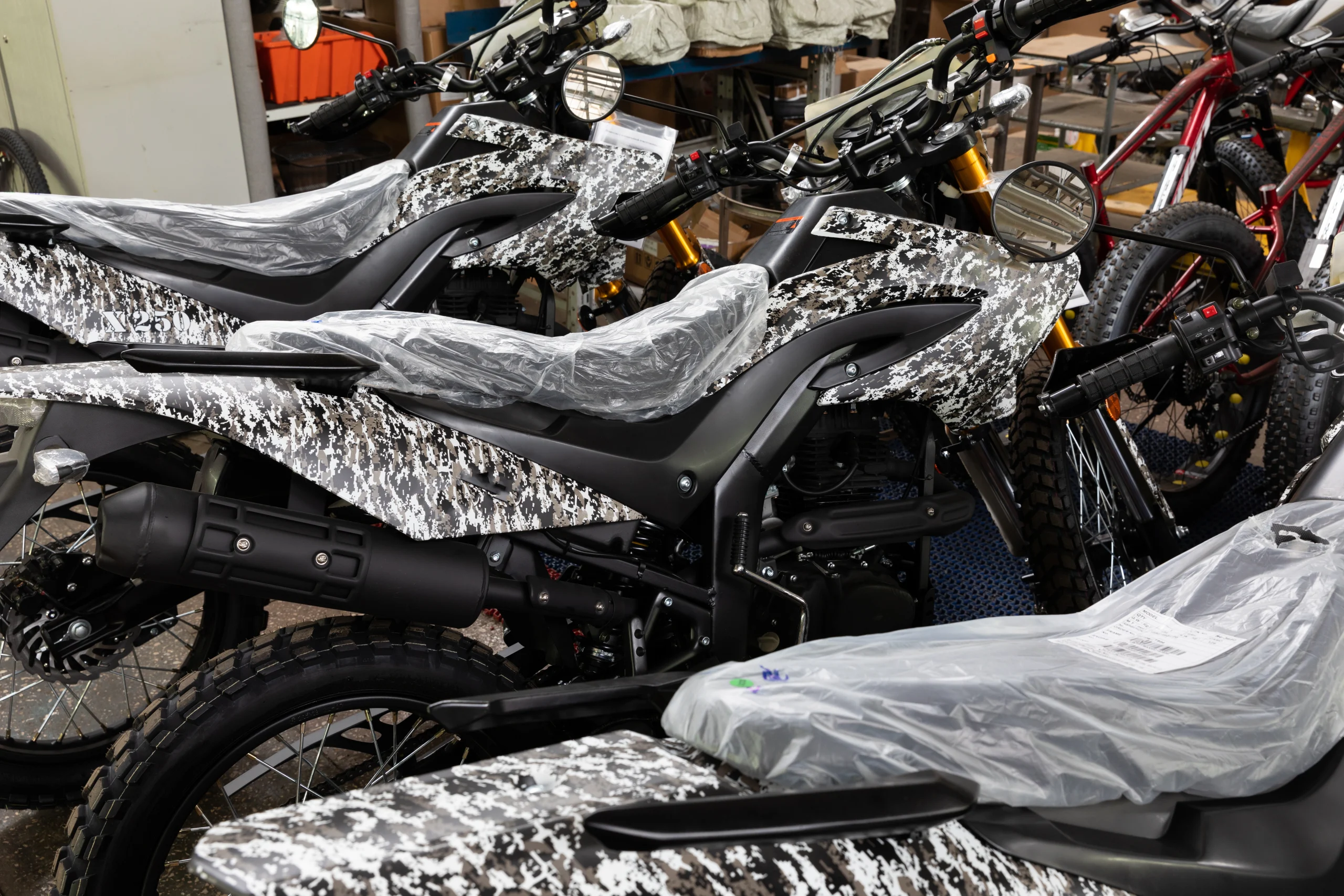 new-motorcycles-at-the-factory-in-camouflage-paint-2025-02-13-21-35-09-utc