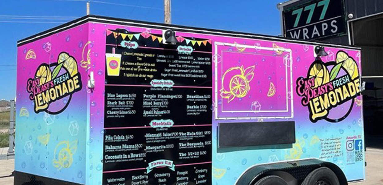 Custom designed and professionally installed lemonade trailer wrap